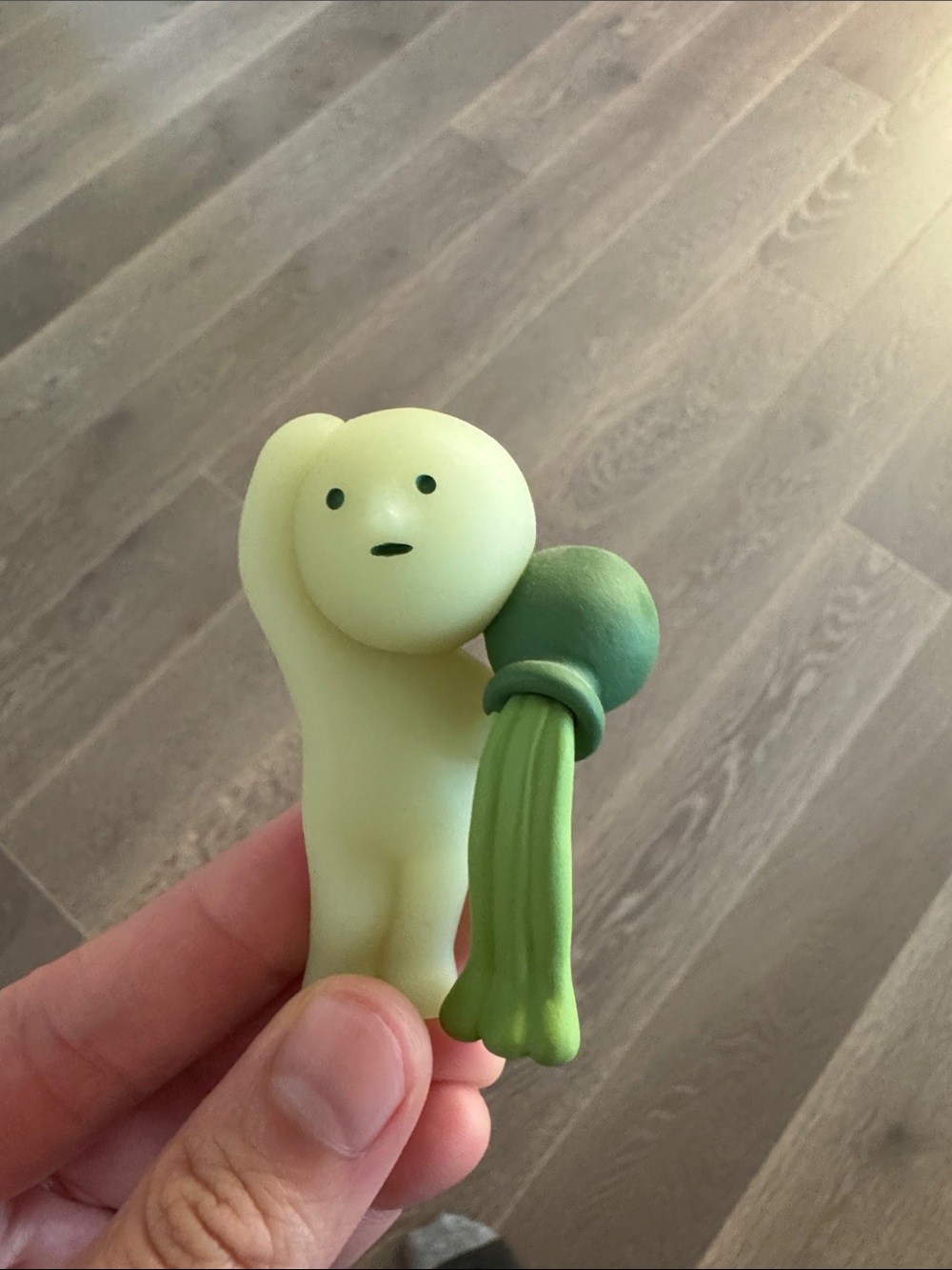 Smiski Cute Pale Green Character Figurine with Dark Green Accessory
